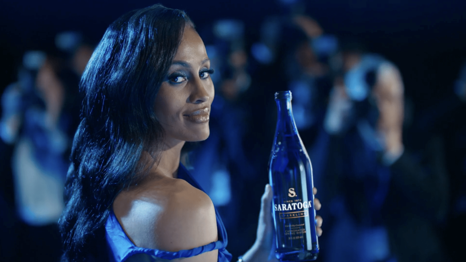 Skylar Diggins holds a bottle of Saratoga Water at Hollywood premier.